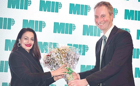 Ameesha Patel and Tor Lund, President and CEO, MIP Inc.