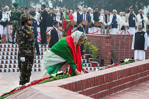 Bangladesh Prime Minister Sheikh Hasina lays a wreath at the national memorial of the 1971 Bangladesh independence war's martyrs to mark the country's Victory Day. (Photo| AFP)