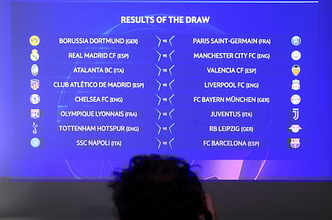 The match fixtures are shown on an electronic panel during the UEFA Champions League 2019/20 round of 16 draw at the UEFA Headquarters in Nyon, Switzerland. (Photo | AP)