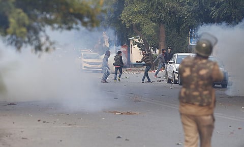 Delhi Police resort to firing teargas shells. (Photo | Arun Kumar P, EPS)