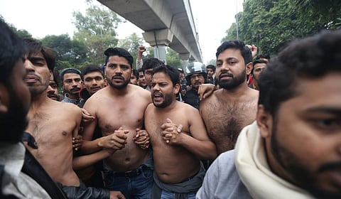Students protesting outside the Jamia Millia Islamia University in New Delhi on Monday. (Photo | Shekhar Yadav/EPS)