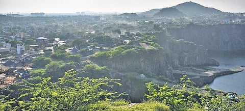 View of rock crushing units dispersing dust into the air at Tirusulam | P jawahar