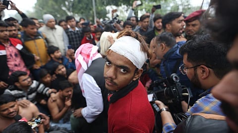 Defiant Jamia students a day after police charged into their campus | Shekhar Yadav, EPS