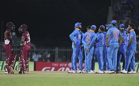 Indian players wait for the umpire's decision on a review for the wicket of West Indies' Shai Hope, left, during the first one day international cricket match between India and West Indies in Chennai. (Photo | AP)