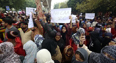 Jamia Millia Islamia university Students gather for a protest against the Citizenship Amendment Act CAA and Sundays alleged police crackdown in the University in New Delhi on Monday December 16 2019. (Photo | EPS)