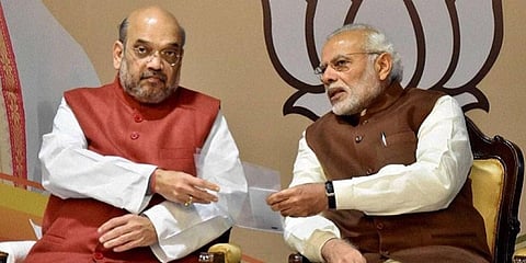PM Narendra Modi (R) and Union Home Minister Amit Shah (Photo | PTI)