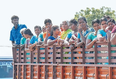 Several women candidates from youngsters to the elderly were seen sporting towels with borders of their party flags | M K Ashok Kumar
