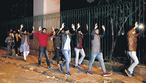Students being escorted out of Jamia Millia Islamia campus by police on Sunday. (File Photo)