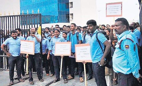 Staff of CMRL protesing at CMRL Headquarters in April | EPS