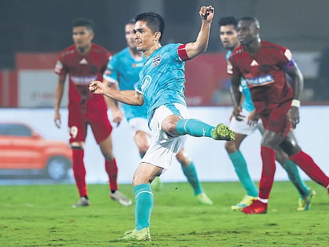 Bengaluru FC skipper Sunil Chhetri scores from the penalty spot against NorthEast United FC on Wednesday| ISL