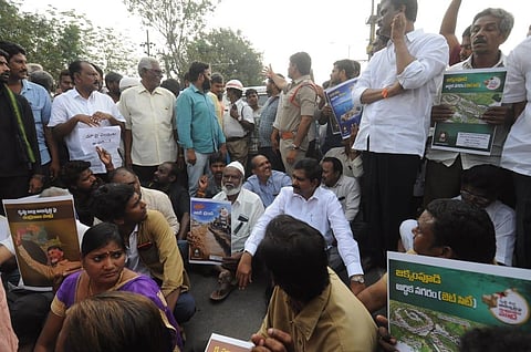 Villagers block a road to stage protest at Amravati on Wednesday. (Photo | Prasant Madugula/EPS)