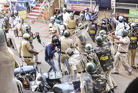 Police personnel baton charge at protestors during a demonstration against the Citizenship Amendment Act (CAA), in Mangaluru, Thursday, Dec. 19, 2019. (Photo | PTI)