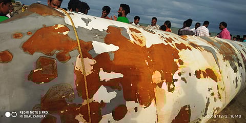 Fishermen with what appears to be one of the solid propellant strap-on motors used by the PSLV to launch satellites | EPS