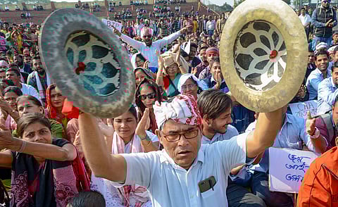 Students from different colleges and local residents protest against the Citizenship Amendment Act 2019 at Jalukbari in Guwahati Wednesday. (Photo | PTI)