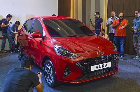 Unveiling of the new 'Hyundai Aura' at an event near Chennai (Photo| PTI)