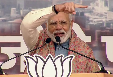 Prime Minister Narendra Modi addresses a BJP rally at Ramlia Maidan, in New Delhi on Sunday. (Photo | ANI)