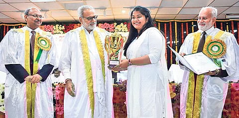 Governor Prof Ganeshi Lal presenting trophy to a student during the 38th Convocation of OUAT in Bhubaneswar on Saturday | EXPRESS