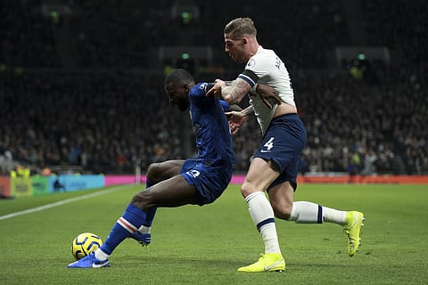 Chelsea's Antonio Rudiger, left, is tackled by Tottenham's Toby Alderweireld. (Photo | AP)