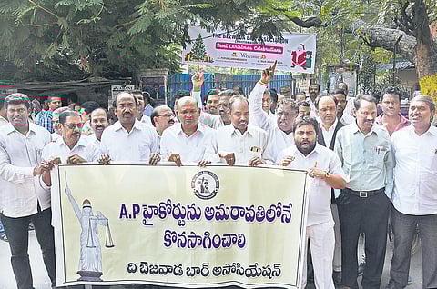 Advocates staging a protest against shifting of the Andhra Pradesh High Court at Civil Courts in Vijayawada on Monday I P Ravindra Babu