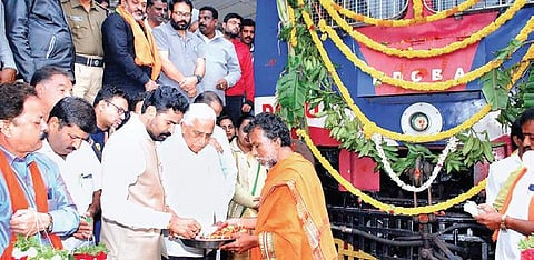 Kolar MP Muniswamy during the launch of a new train in Kolar on Monday