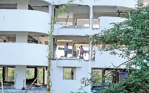 Holy Faith H2O, one of the apartments in Maradu which violated the CRZ norms, being demolished by Vijay Steels workers | A Sanesh
