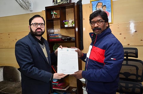 Jharkhand Chief Minister-designate Hemant Soren being offered the official letter of oath ceremony by State Chief Secretary D K Tiwari in Ranchi Jharkhand Thursday Dec. 26 2019. (Photo | PTI)