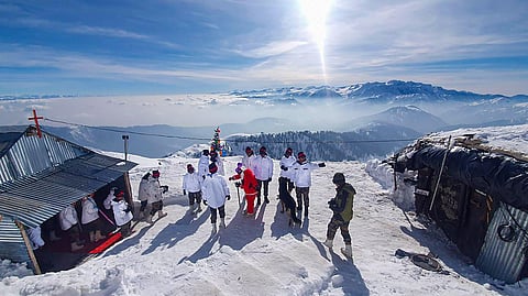 Army jawans seen outside their camps at a snow-covered mountain in north Kashmir Thursday Dec. 26 2019. (Photo | PTI)