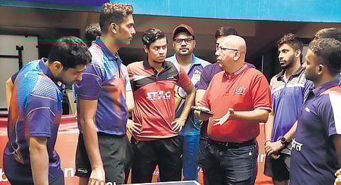 Former national champion and coach Kamlesh Mehta (3rd R) interacts with the Indian men’s table tennis team in Chennai on Friday | D sampathkumar