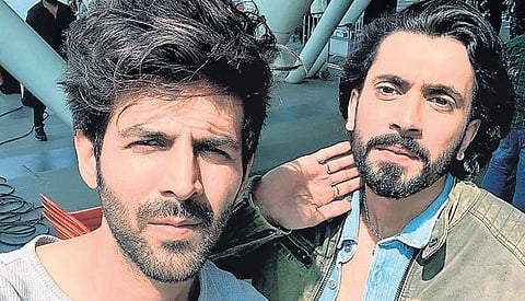 Actors Sunny Singh and Kartik Aaryan pose for a selfie.