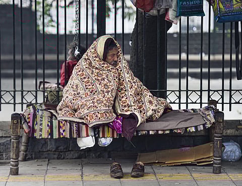 A man wrapped in woollens in cold winter morning in New Delhi Sunday Dec. 29 2019. (Photo | PTI)