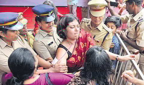 Police remove agitating Indian History Congress delegates who protested against Kerala Governor Arif Mohammed Khan during his inaugural speech at the Kannur University on Saturday | Express