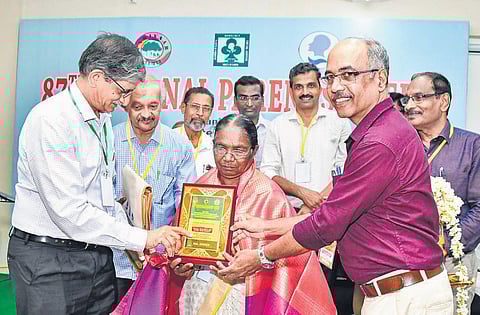 Ammalu Amma being felicitated at the Regional Parents’ Meet of Children with Disabilities in Kozhikode on Saturday | Express