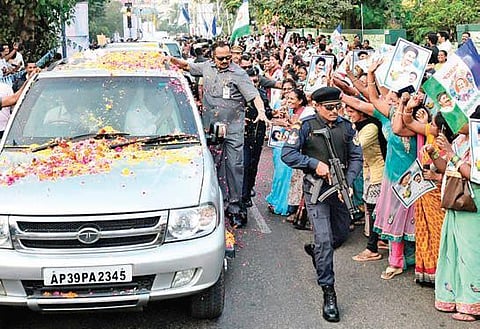 People form a human chain and shower flowers on Chief Minister YS Jagan Mohan Reddy’s convoy in Visakhapatnam on Saturday during the inauguration of two-day Visakha Utsav. (Photo | EPS)
