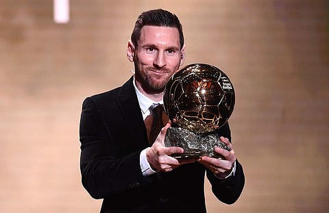 Barcelona's Argentinian forward Lionel Messi reacts after winning the Ballon d'Or France Football 2019 trophy at the Chatelet Theatre in Paris. (Photo | AP)