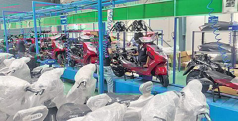 (L-R) Amit Raj Singh, co-founder and MD, Gemopai Electric and the company’s production unit in Greater Noida, UP | Express