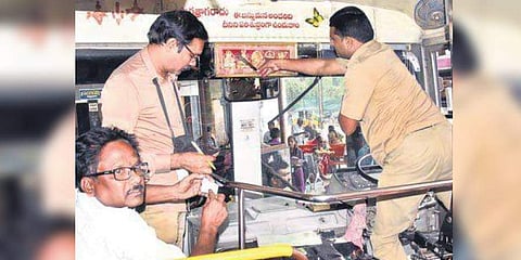 TSRTC staff who had ended their strike get ready to operate a bus in Hyderabad. (Photo |Sathya Keerthi)