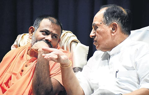 Rajya Sabha MP Subramanian Swamy having a word with Sreepeetham seer Swami Paripoornananda Saraswati at SPMVV in Tirupati on Sunday I Express