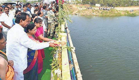 Chief Minister K Chandrasekhar Rao performs Jala Harathi at Mid Manair Dam on Monday