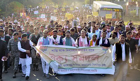 Senior BJP leader Himanta Biswa Sarma with Assam State BJP president Ranjeet Kumar Das, AGP president Atul Bora and other party leaders takes part in a peace rally at Sualkuchi in Kamrup district of Assam Sunday Dec. 29 2019. (Photo | PTI)
