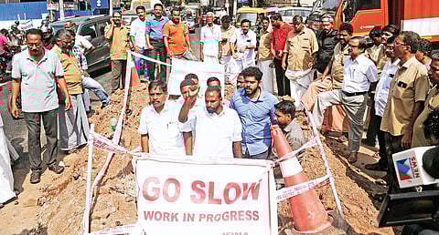 Residents and members of various political organisations protesting at the newly repaired Thammanam-Vyttila Road