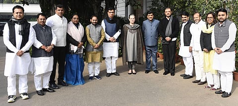 Congress interim president Sonia Gandhi poses for a group photo with party leaders who were appointed as ministers during the cabinet expansion of Maharashtra alliance government in New Delhi Tuesday Dec. 31 2019. (Photo | PTI)