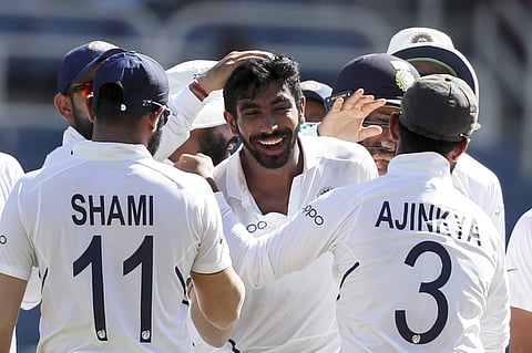 India's Jasprit Bumrah celebrates with Shami and Rahane (Photo | AP)