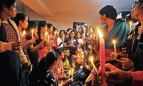 Women techies take out a candlelight rally demanding justice for Disha’s family, at Hitec City on Tuesday. (Photo | S Senbagapandiyan, EPS)