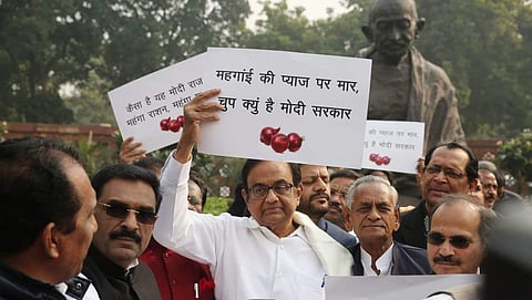 P Chidambaram with Congress MPs protesting against the Onion price hike at Parliament house in New Delhi on Thursday. (Photo | Shekhar Yadav)