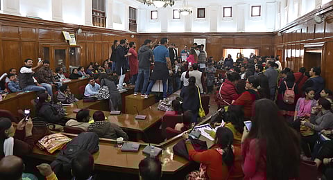 Delhi University Teachers’ Association shouts slogans during their protest inside the VC executive council hall at Delhi University in New Delhi on Wednesday (Photo | Arun Kumar, EPS)