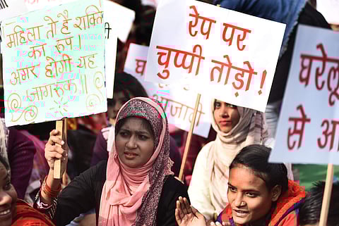 Women participate in a peaceful demonstration during Delhi Commission for DCW chairperson Swati Maliwal's hunger strike (Photo | Parveen Negi, EPS)