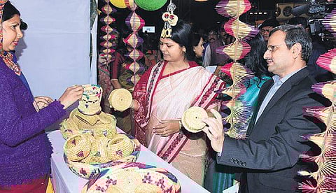 Minister Tukuni Sahoo and Development Commissioner Suresh Chandra Mahapatra at Mission Shakti Mela in Bhubaneswar on Thursday | Express
