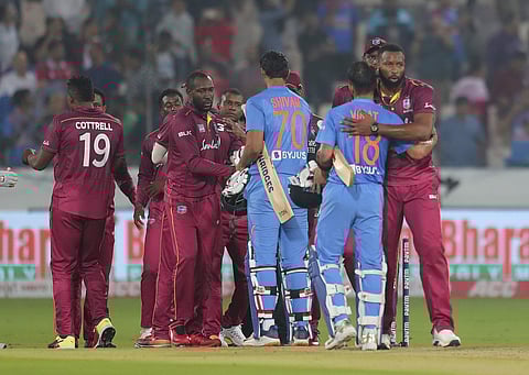 West Indies' captain Kieron Pollard, right, hugs India's captain Virat Kohli after India's win. (Photo | AP)