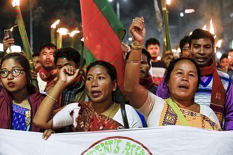 People holding torches march during a protest over the Citizenship Amendment Bill 2019 CAB in Guwahati Saturday Dec. 7 2019. (Photo | PTI)