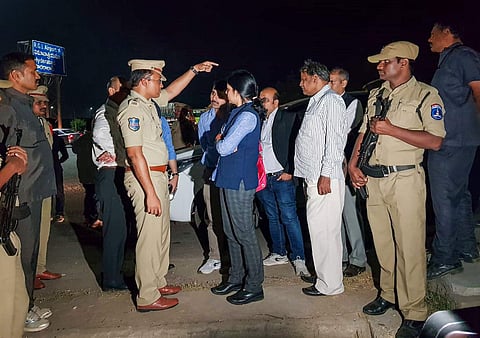 NHRC members visit the encounter site where yesterday police shot dead four accused involved in the rape-and-murder case of a woman veterinarian at Shamshabad in Hyderabad Saturday Dec. 7 2019. (Photo | PTI)